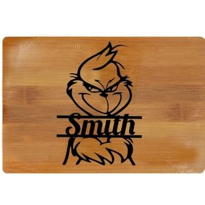 Grinch laser engraved cutting board